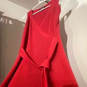 Super cute ribbed tie wrap dress from express. Color is close to rust red